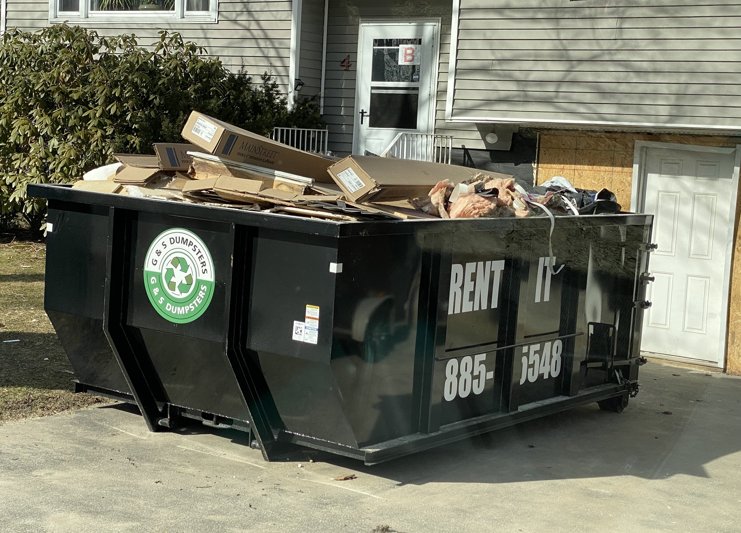 filled dumpster ready for pickup