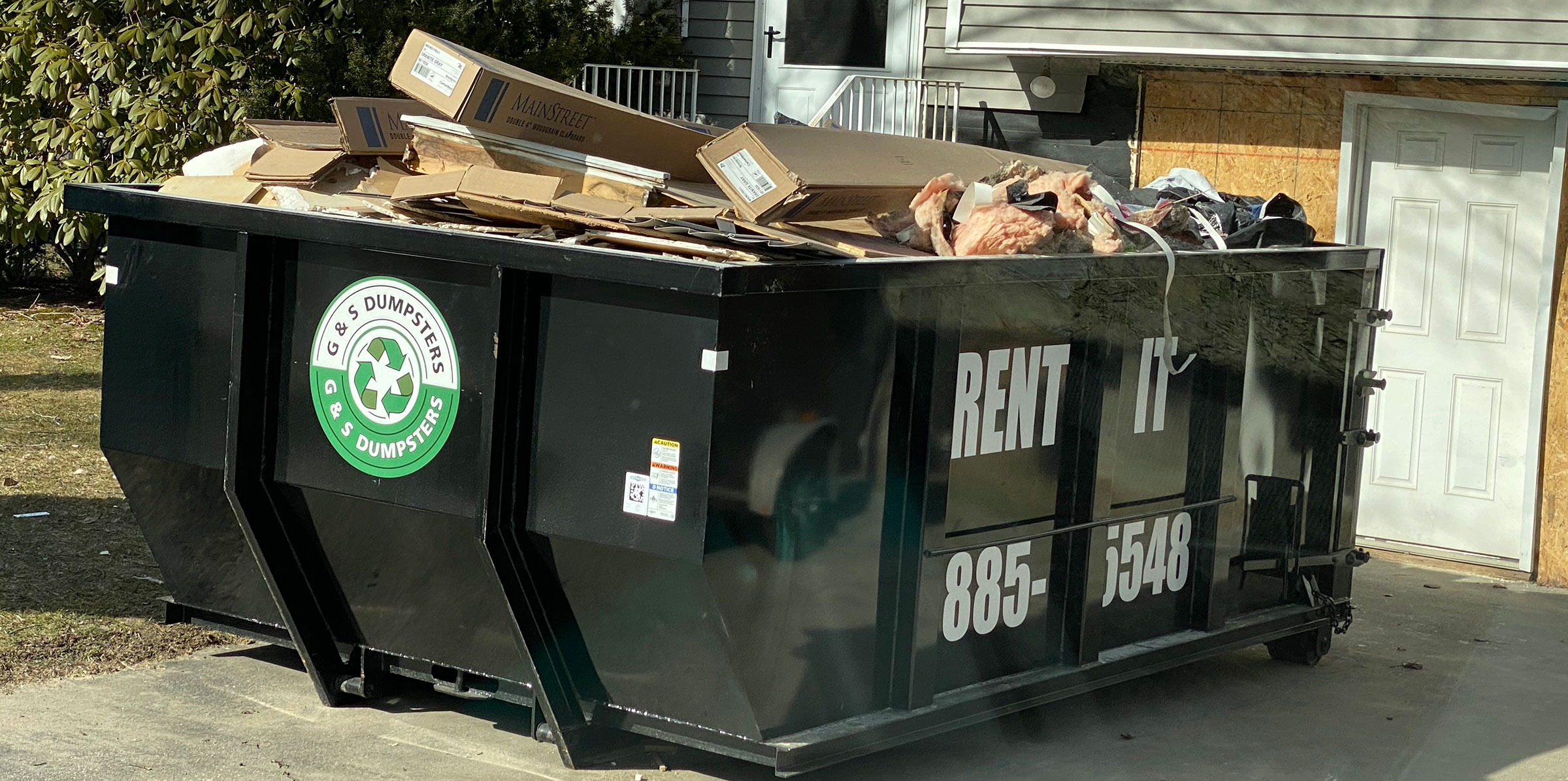 filled dumpster ready for pickup